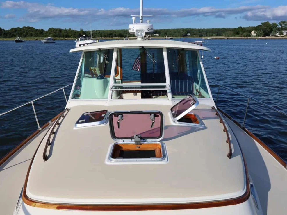 Image of REPETE, 2004 Bruckmann Bluestar 37, view of cabin trunk and pilothouse windows.