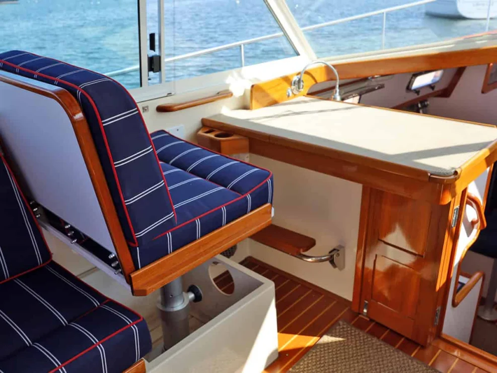 Image of REPETE, 2004 Bruckmann Bluestar 37, view of mate's seat and chart table.