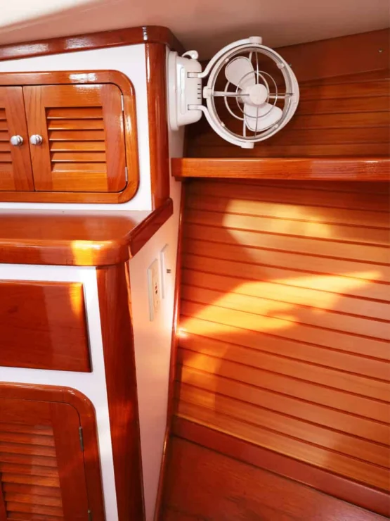 Image of REPETE, 2004 Bruckmann Bluestar 37 showing cabin joinery detail and fan.