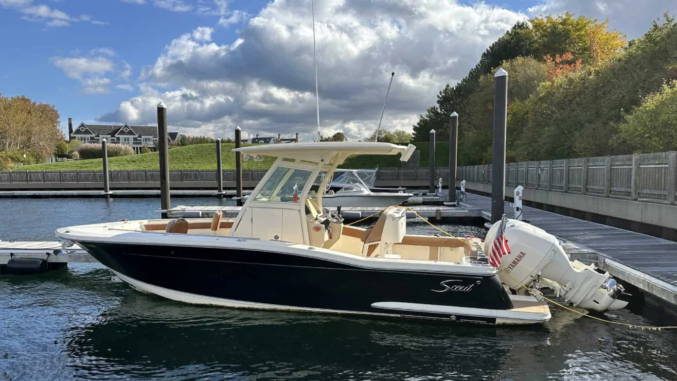 2017 Scout 255 LXF profile view on the dock.