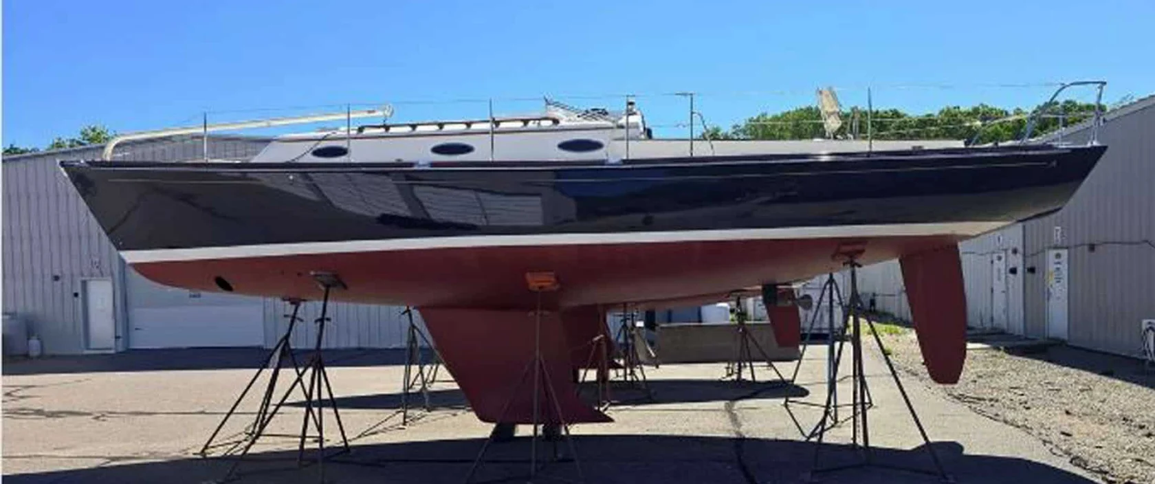 2017 Alerion 41 racer/cruiser sailboat on jack stands in a boatyard.
