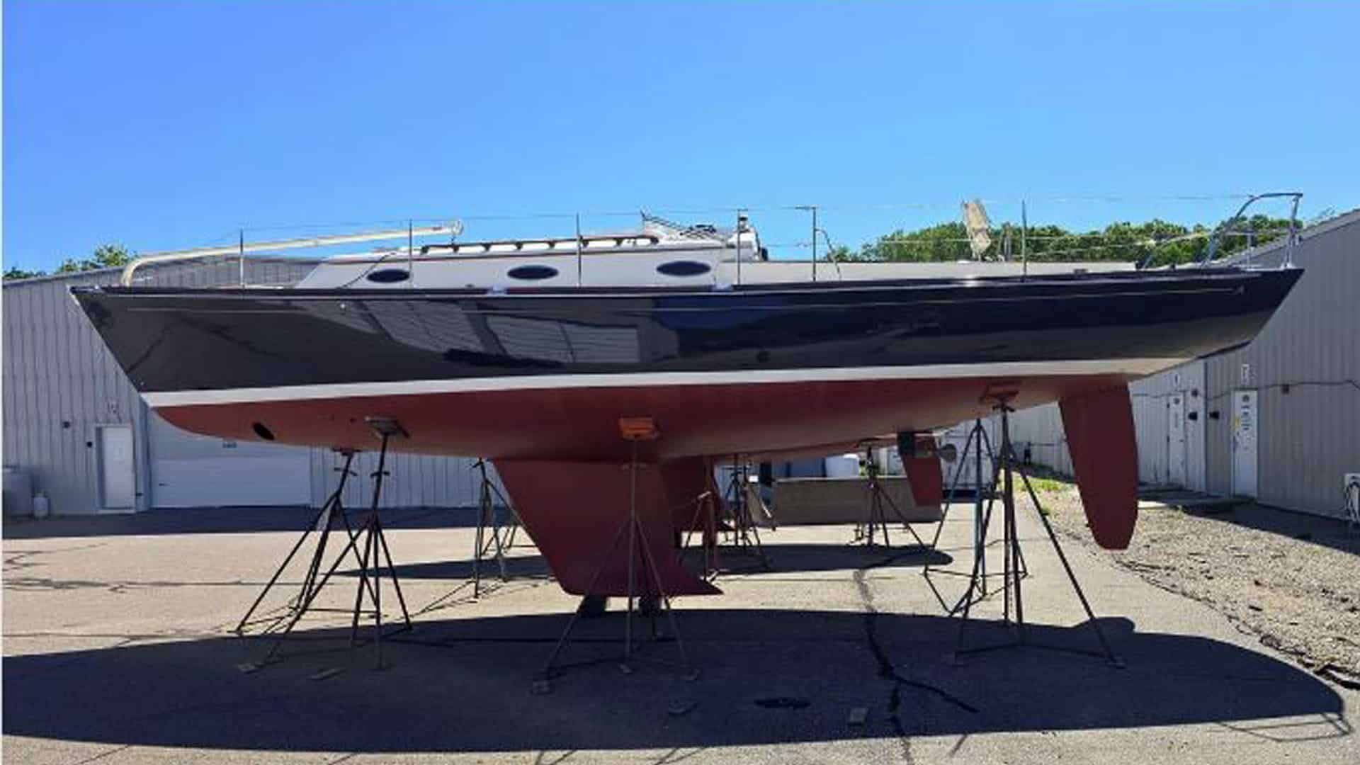 2017 Alerion 41 racer/cruiser sailboat on jack stands in a boatyard.