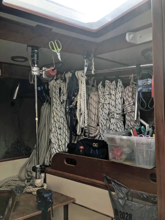 Yacht storage locker with rigged ropes.