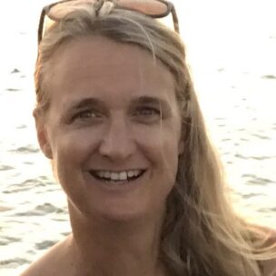 Carolyn, yacht broker for Wellington Yacht Partners in Portsmouth, Rhode Island, pictured by the water.