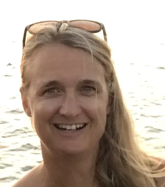 Carolyn, yacht broker for Wellington Yacht Partners in Portsmouth, Rhode Island, pictured by the water.