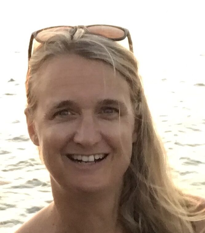 Carolyn, yacht broker for Wellington Yacht Partners in Portsmouth, Rhode Island, pictured by the water.