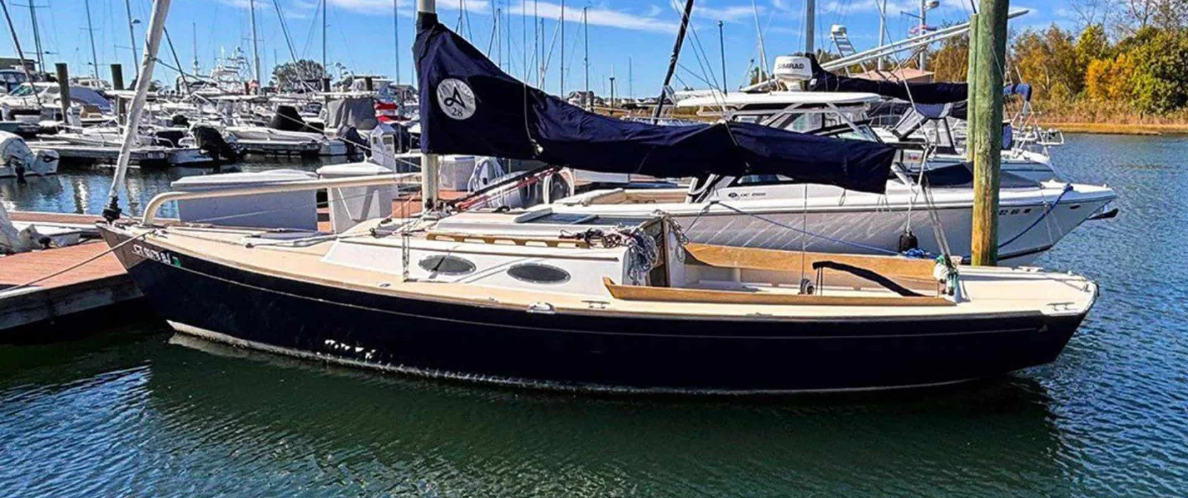 2016 Alerion Express 28, "Mavis", port side profile on the dock.