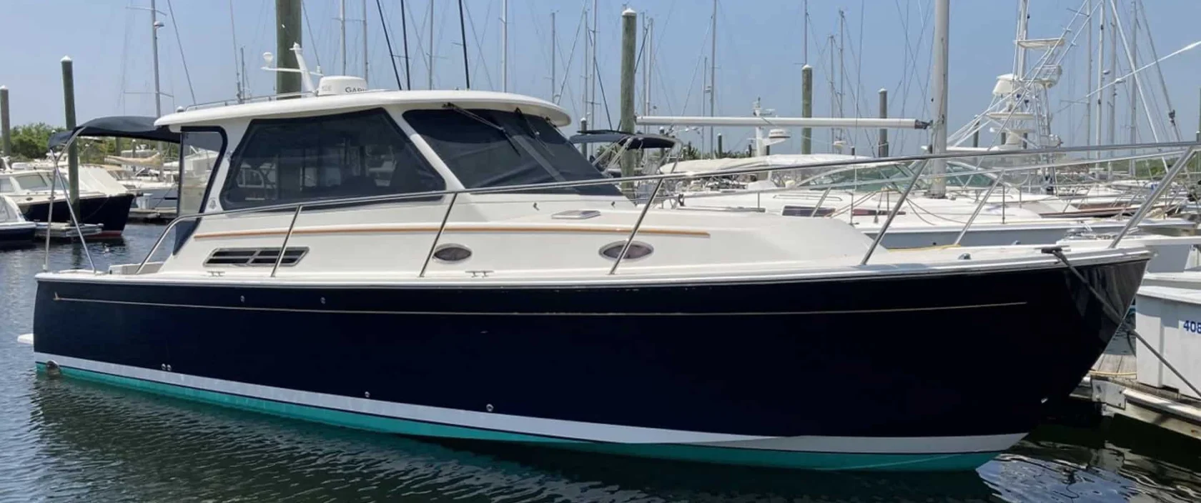 2008 Back Cove 33 "Better Together" port side profile on the dock.
