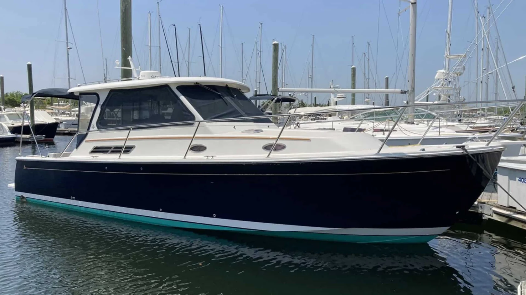 2008 Back Cove 33 "Better Together" port side profile on the dock.