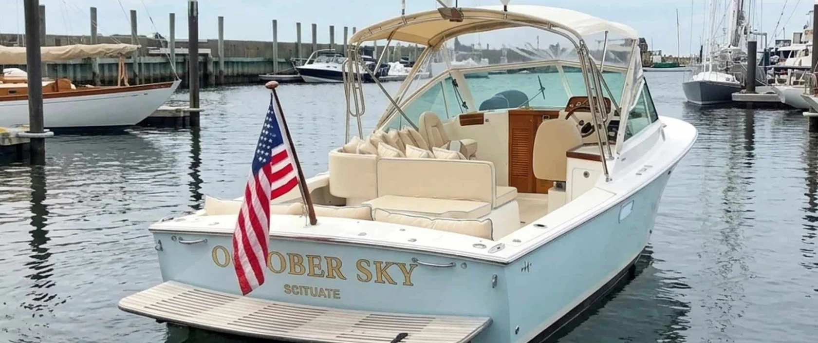 2007 Hunt Harrier 25 stern view of boat at rest in the harbor.