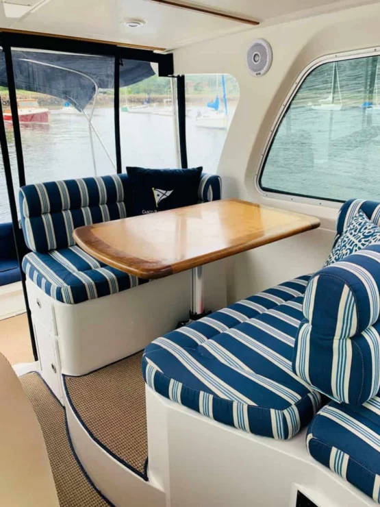 2008 Back Cove 33 "Better Together" helm deck settee and table.