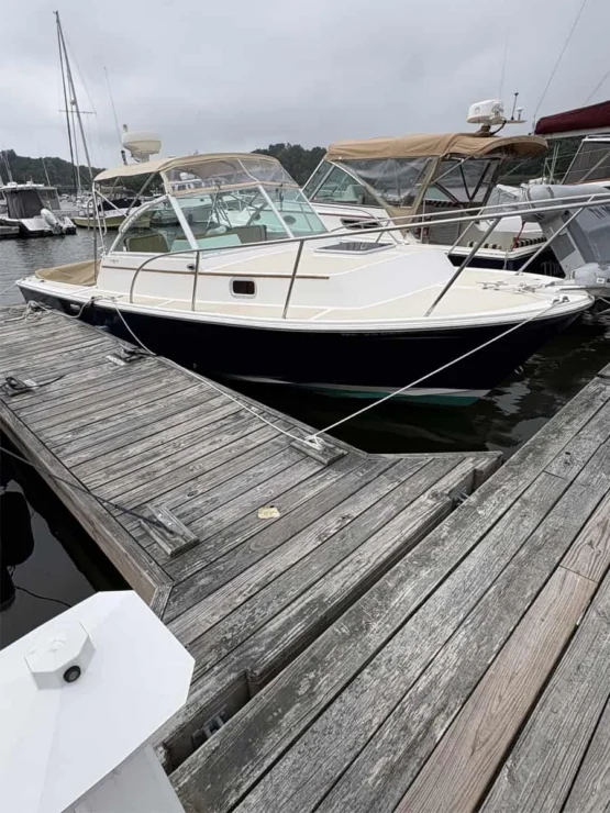 2005 Hunt Yachts Surfhunter 25 for sale starboard bow view on dock.