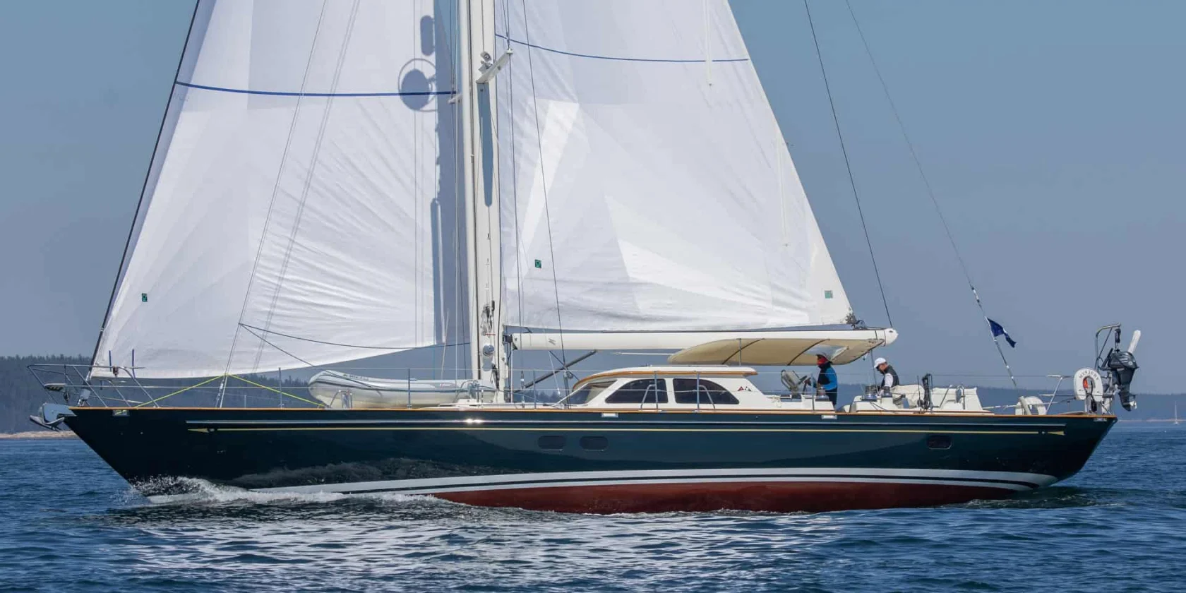 2001 Lyman Morse 63, port side view sailing.