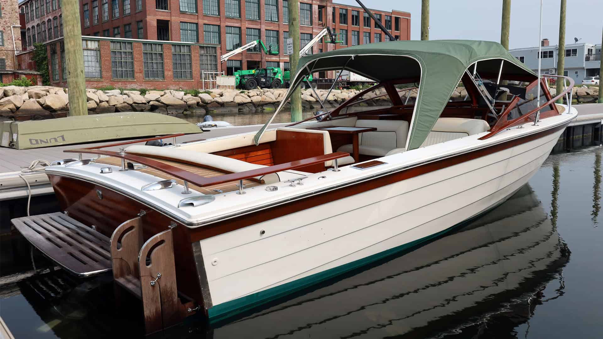 1990 Windsor Craft 26 Picnic Boat, starboard side quarter view at the dock.
