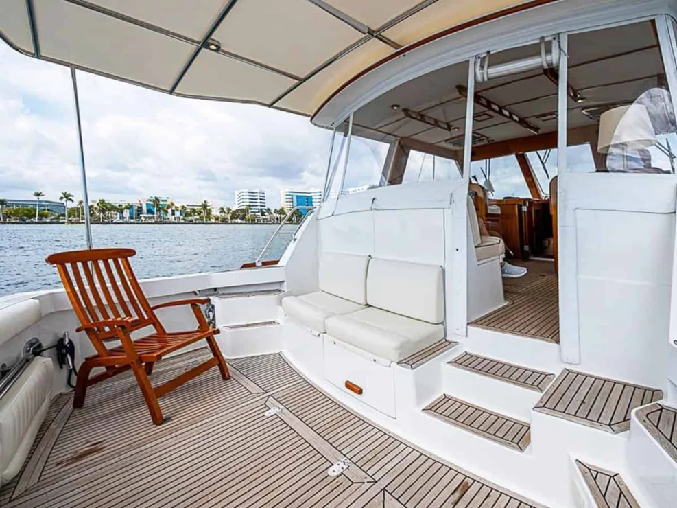 2001 Grand Banks Eastbay 46 Sweet cockpit with teak sole looking to port under bimini sureshade.