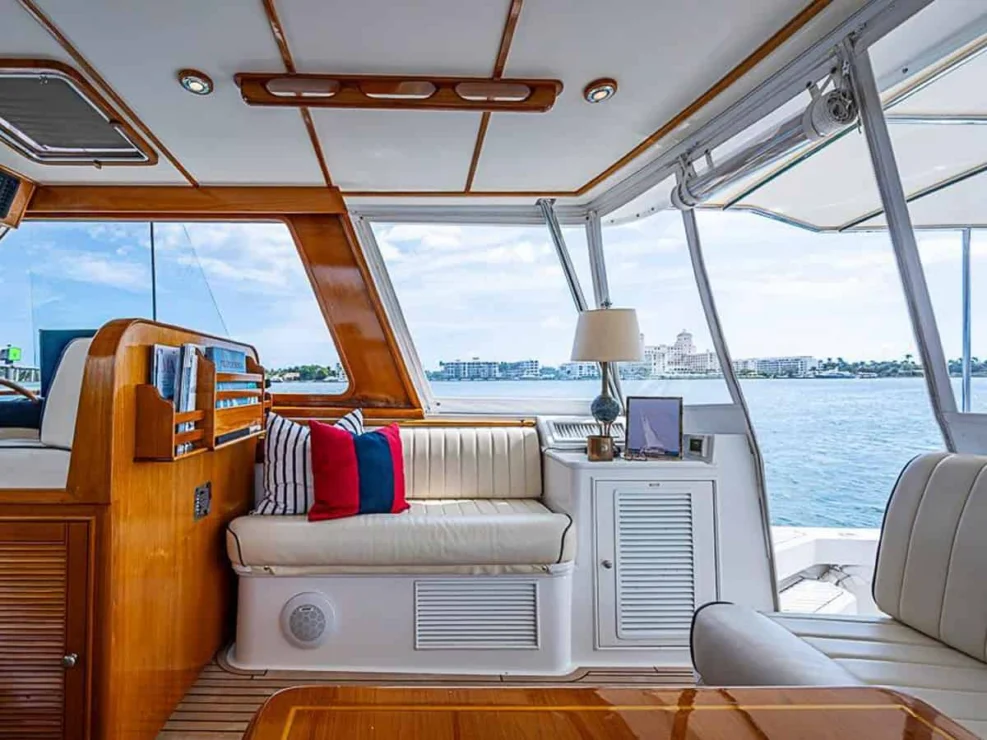 2001 Grand Banks Eastbay 46 Sweet settee to starboard behind helm seat in pilothouse.