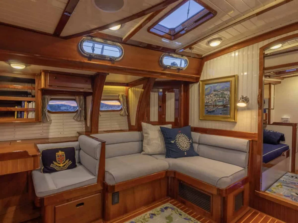 2001 Lyman Morse 63 for sale, view of port side salon and navigation station.