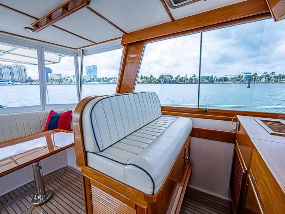 2001 Grand Banks Eastbay 46 Sweet pilothouse double companion seat.