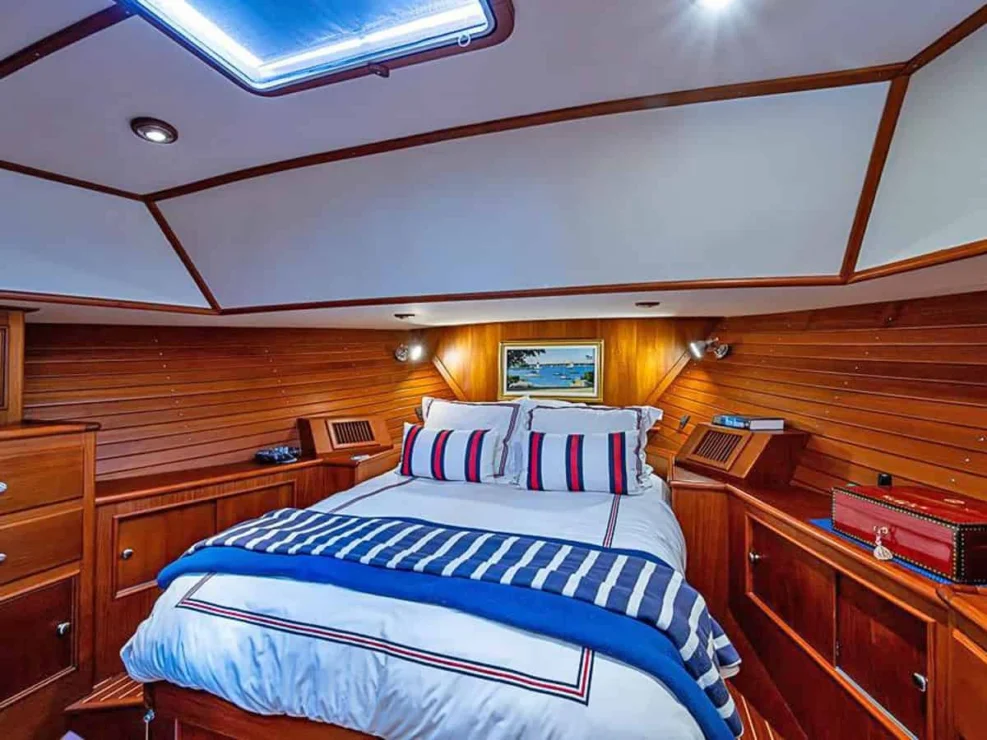2001 Grand Banks Eastbay 46 Sweet primary cabin wirth centerline island berth, reading lights and storage.