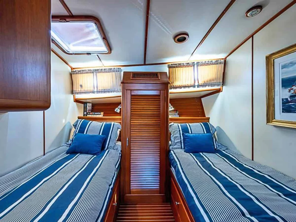 2001 Grand Banks Eastbay 46 Sweet guest cabin with twin berths and storage locker between.