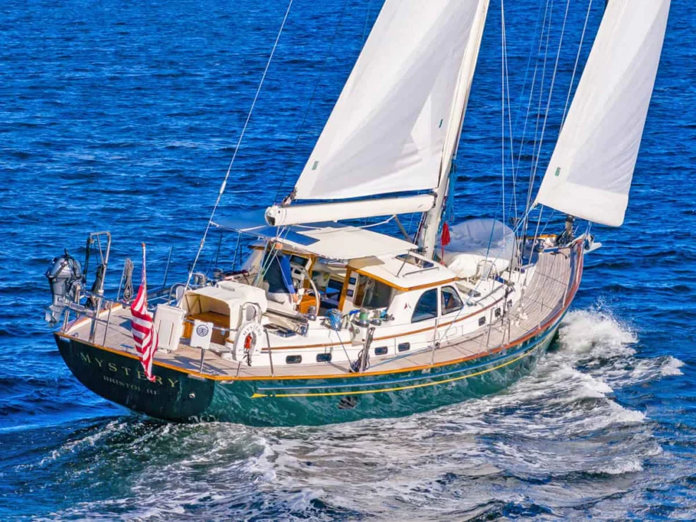 Lyman Morse 63 for sale, stern view under sail.