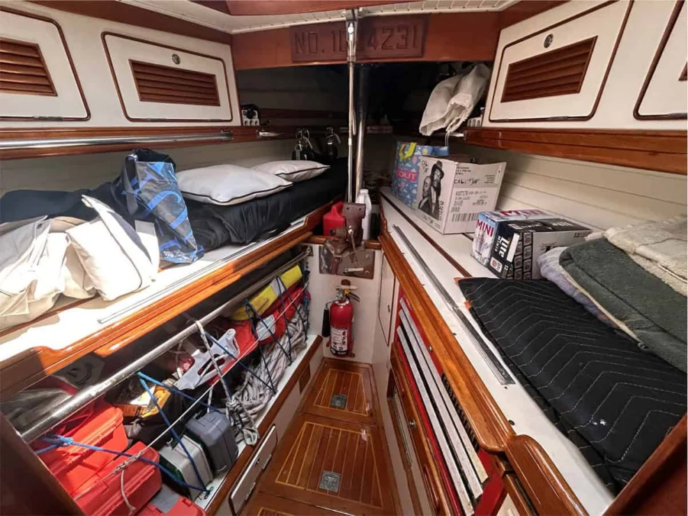 1994 Little Harbor 60 for sale - forepeak storage area with cabinets.