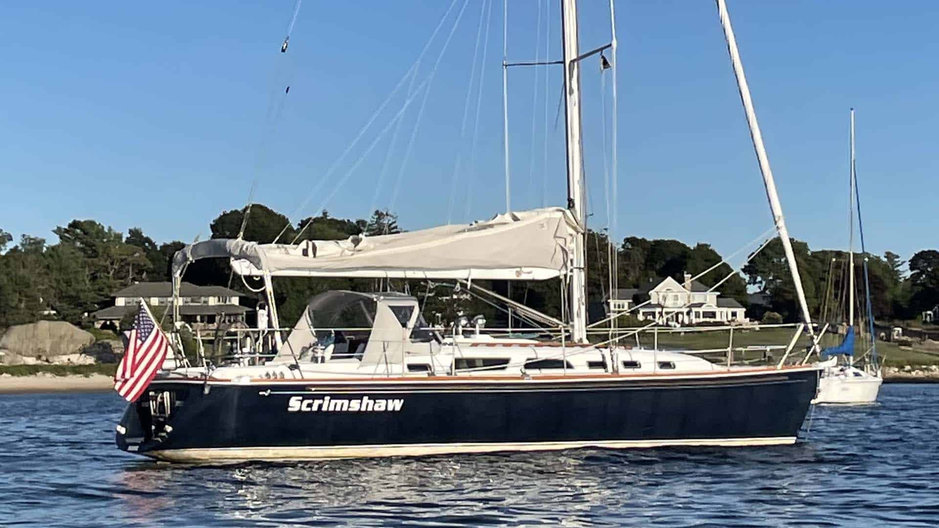 Sabre 402, portside view sitting on mooring.