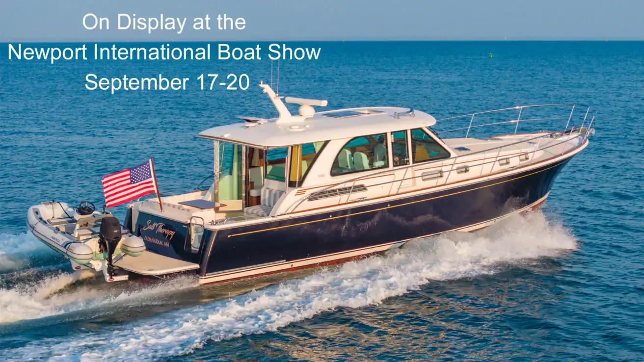 Sabre 45 Salon Express Salt Therapy cruising on the water with boat show message.