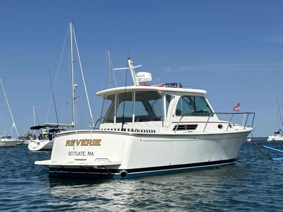 Image of 2016 Back Cove 30 REVERIE with view of aft starboard quarter and transom.