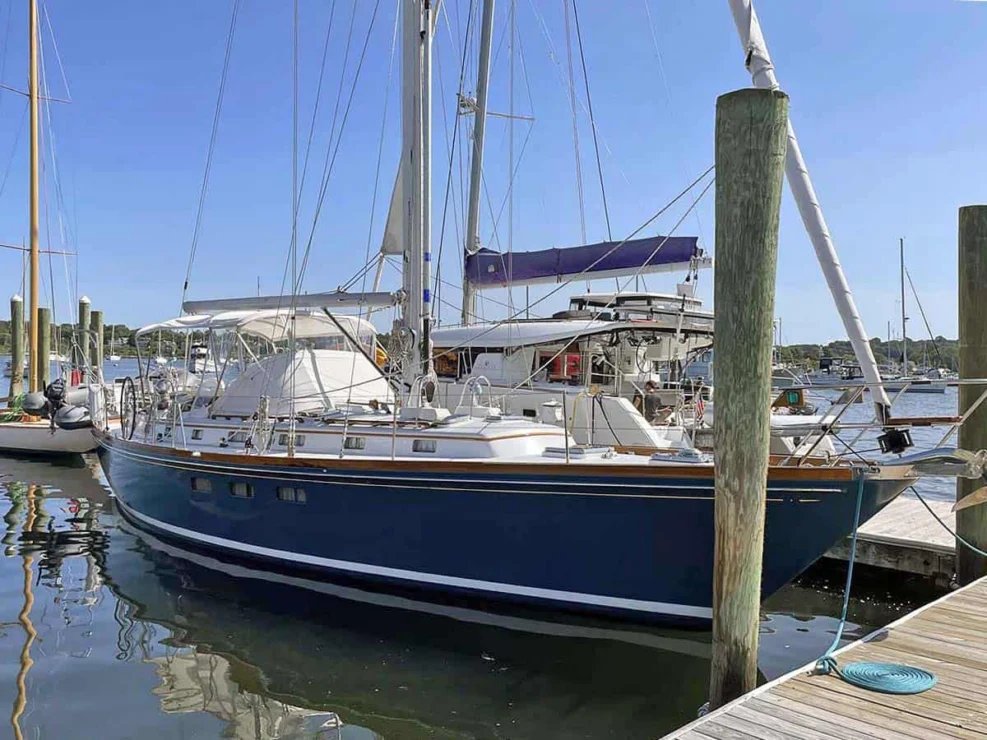 1990 Little Harbor 46 for sale, showing image of starboard bow at dock.