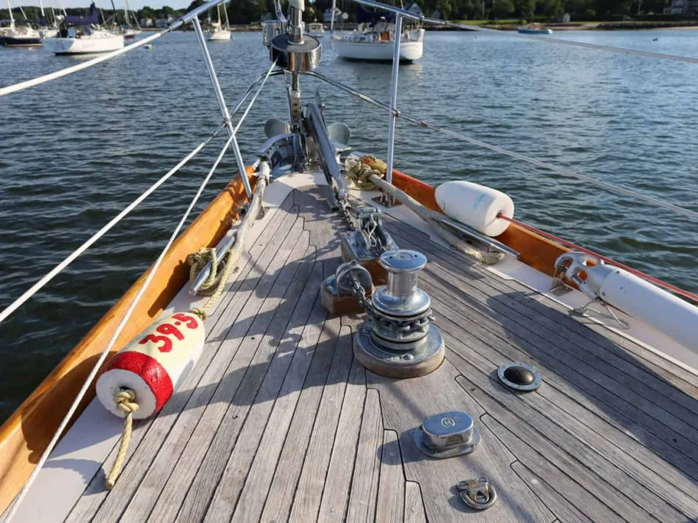 Image of MOONLIGHT, 1980 Hinckley Bermuda 40 MKII, foredeck detail with anchor chain.