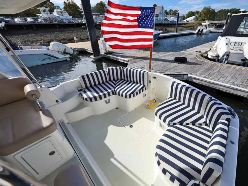 Image of 2016 Back Cove 30 REVERIE with view of cockpit with upholstered seating.