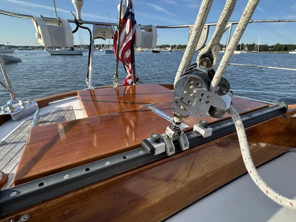 Image of MOONLIGHT, 1980 Hinckley Bermuda 40 MKII, detail of traveler behind helm.