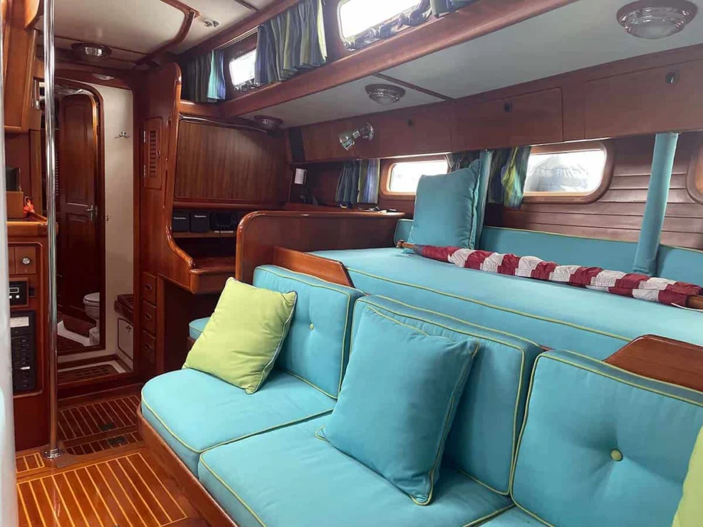 1990 Little Harbor 46 for sale, showing image of the port salon settee with adjacent pilot berth outboard.