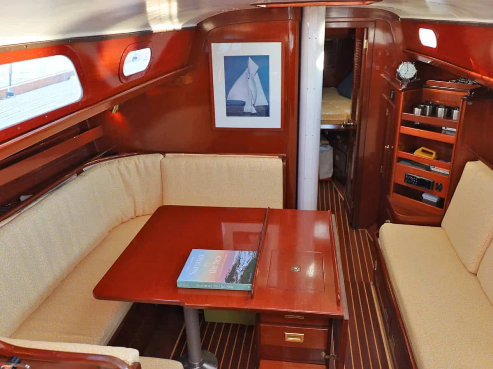 Image of MOONLIGHT, 1980 Hinckley Bermuda 40 MKII, view of port salon forward.