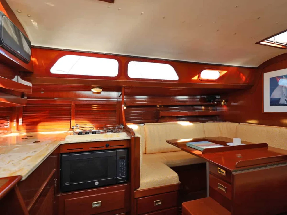 Image of MOONLIGHT, 1980 Hinckley Bermuda 40 MKII, view of main salon port aft with galley.