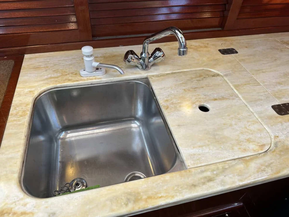 Image of MOONLIGHT, 1980 Hinckley Bermuda 40 MKII, view of undercounter sink in galley.