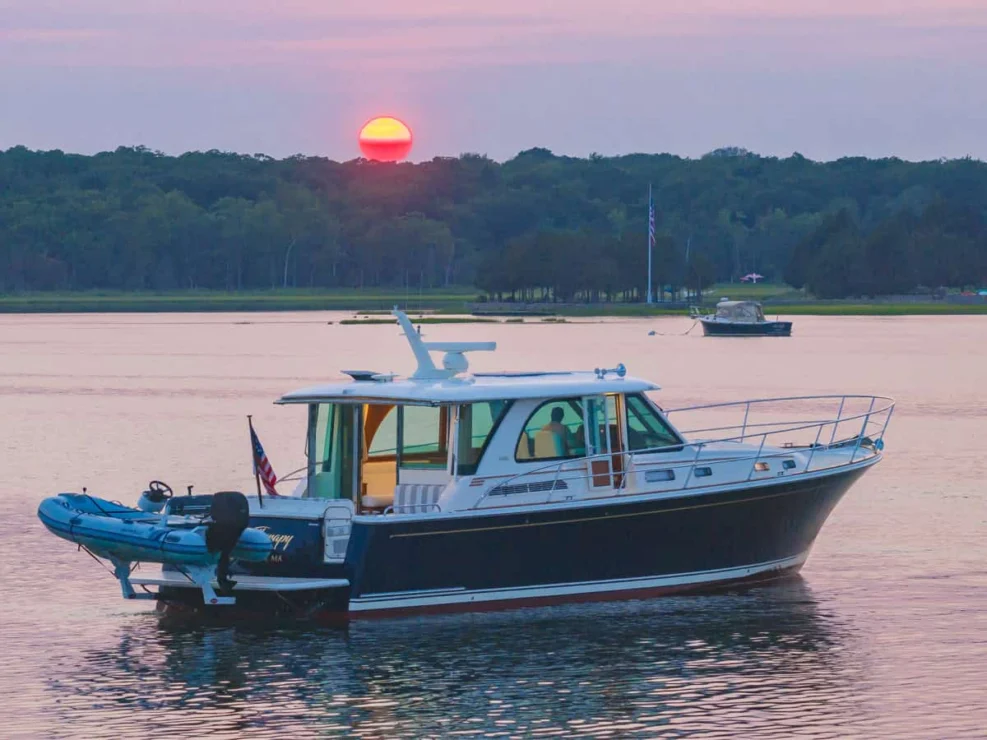 Sabre 45, Salt Therapy, view of starboard beam in the water at sunset.