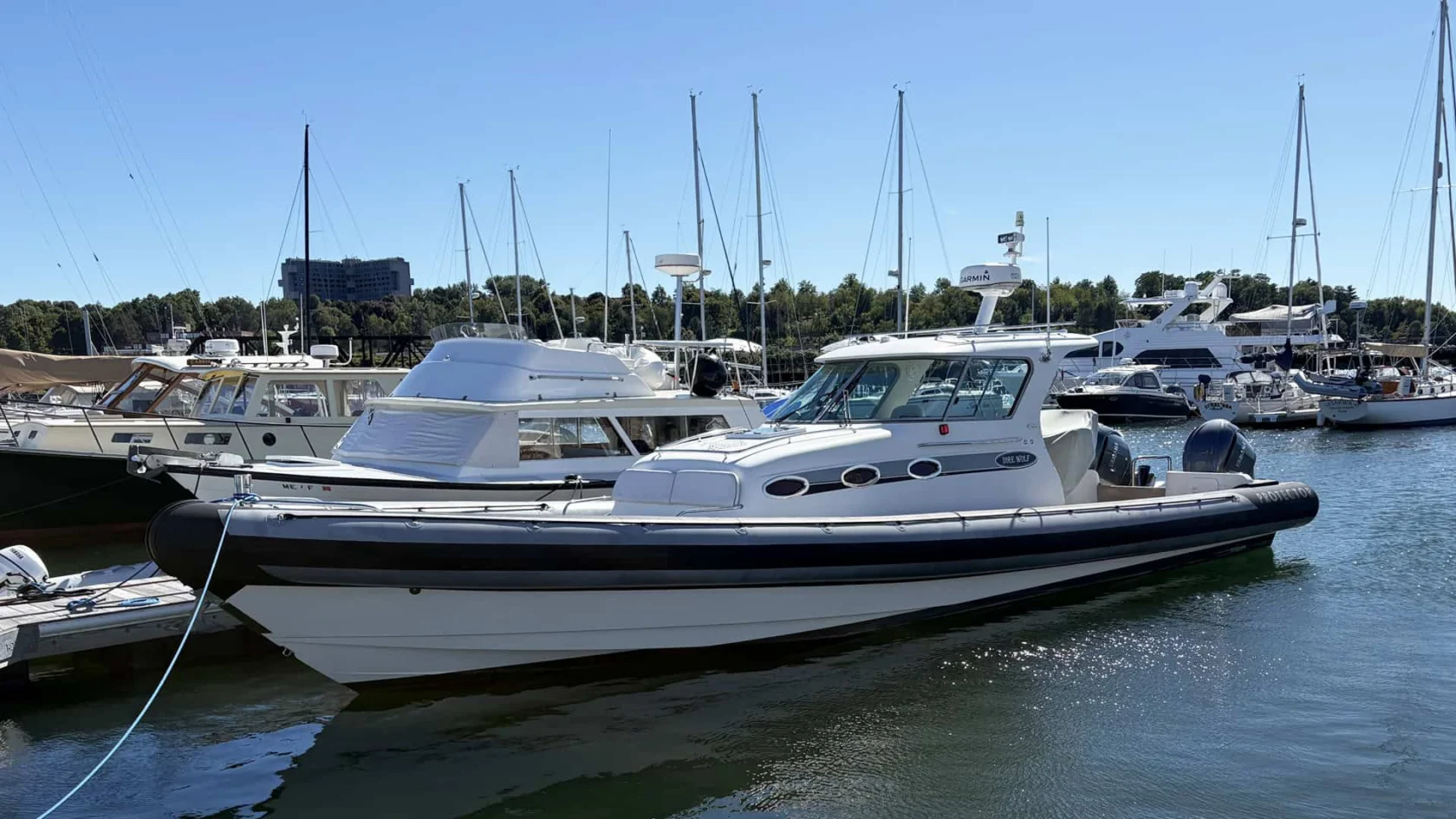 2011 Protector Tauranga 41 port beam at dock.