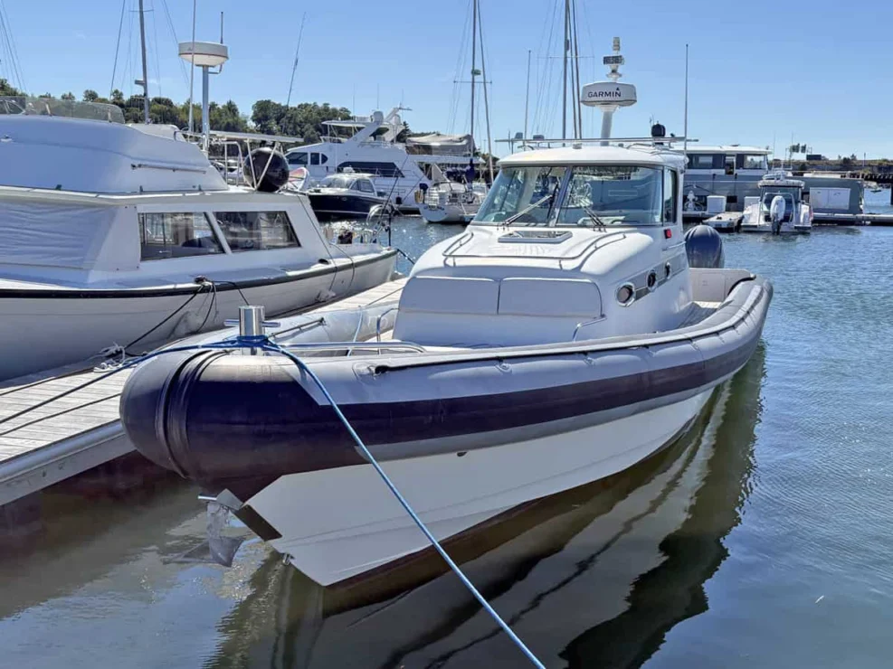 2011 Protector Tauranga 41 port bow at dock.