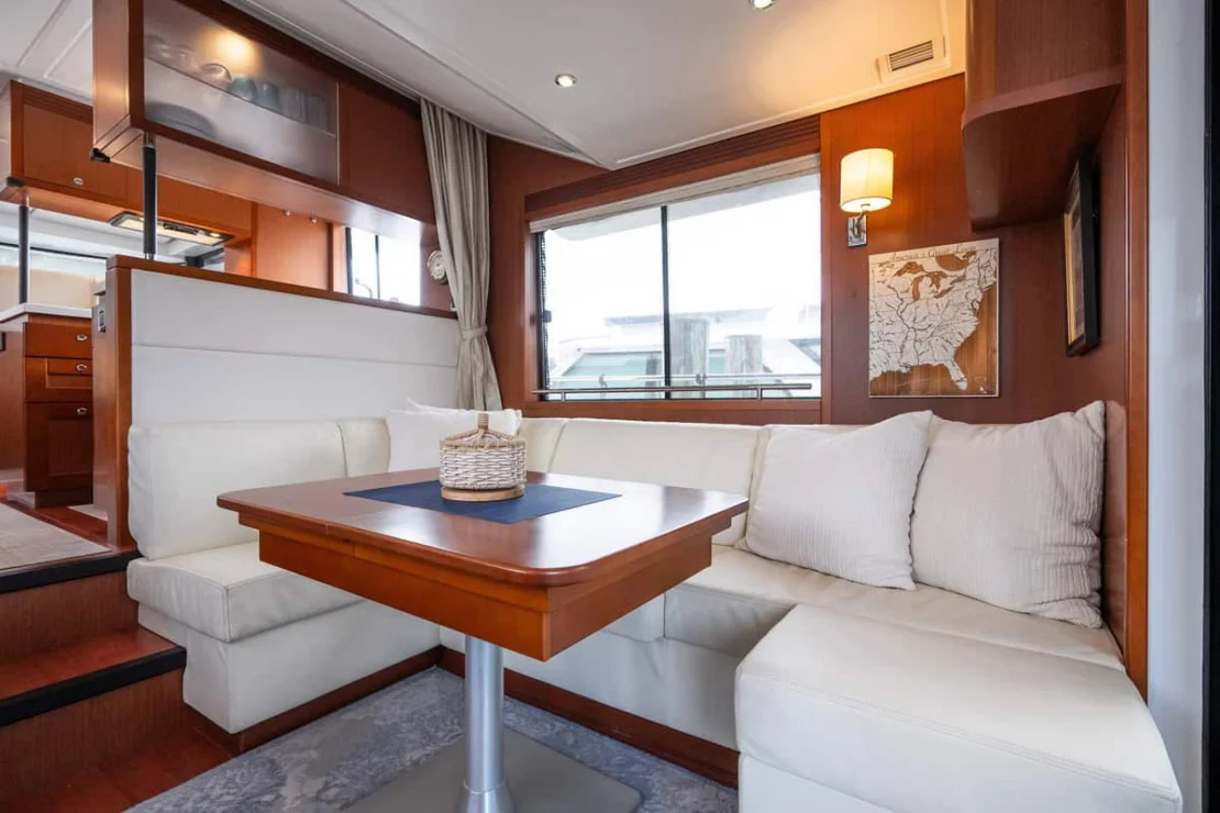 Beneteau Oceanis Swift Trawler 50 pilothouse dinette and table.