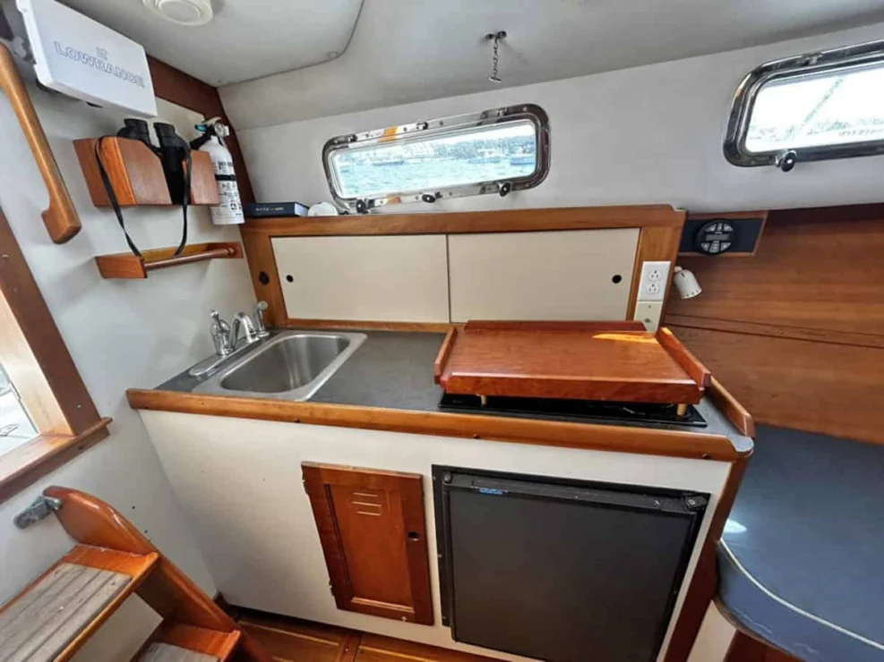 2000 Legacy 28 Express interior with galley to port.