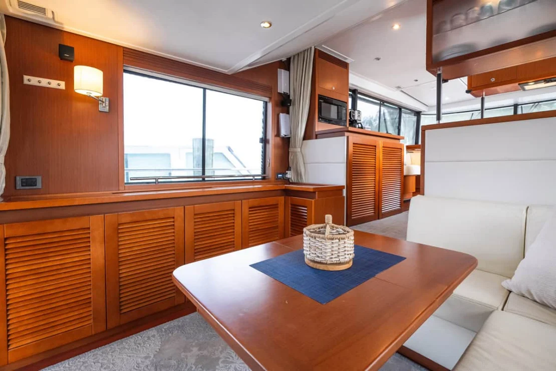 Beneteau Oceanis Swift Trawler 50 pilothouse storage and wide windows.