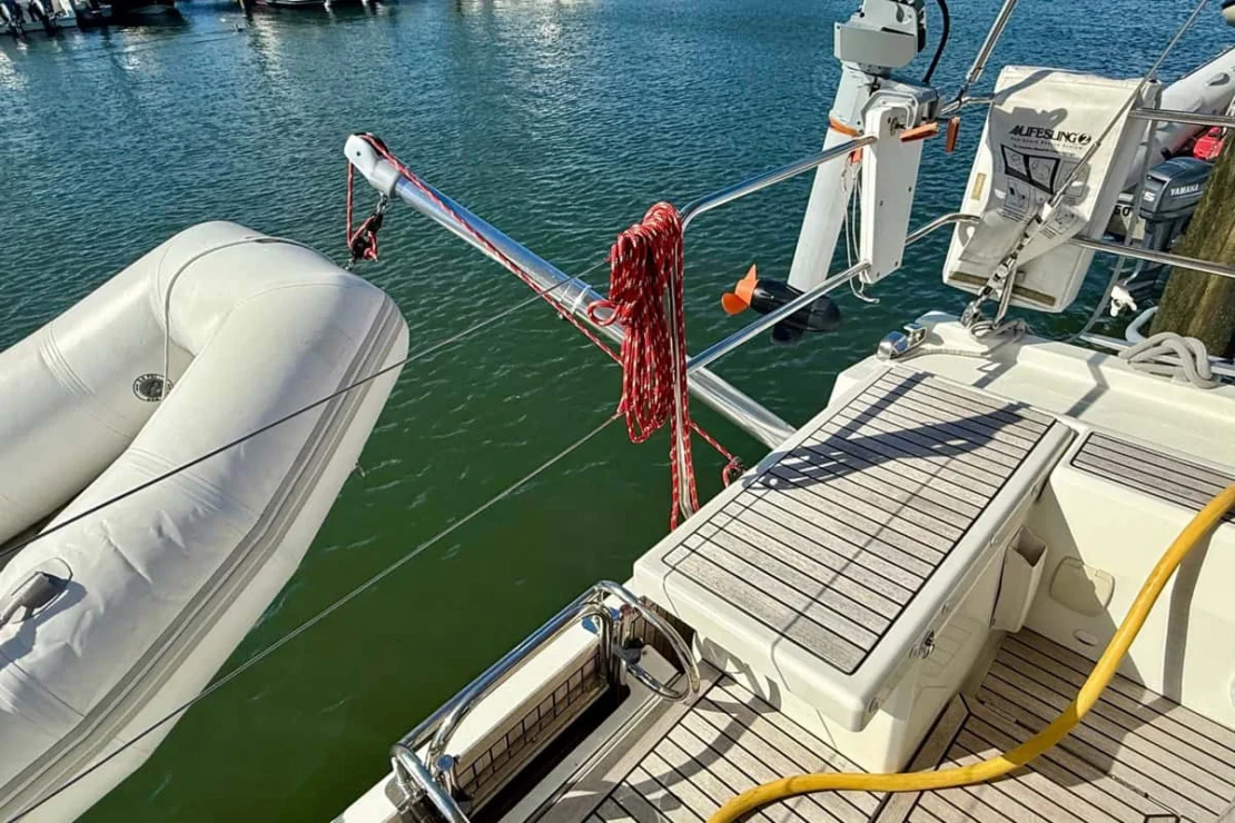 Beneteau Oceanis 51, tender off stern.