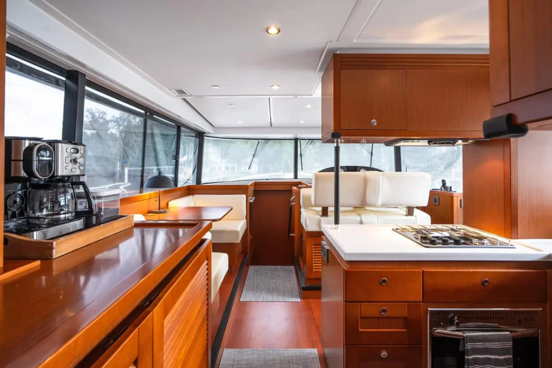 Beneteau Oceanis Swift Trawler 50 pilothouse forward to galley.
