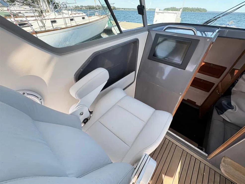 2011 Protector Tauranga 41 companion seating and companionway to port.