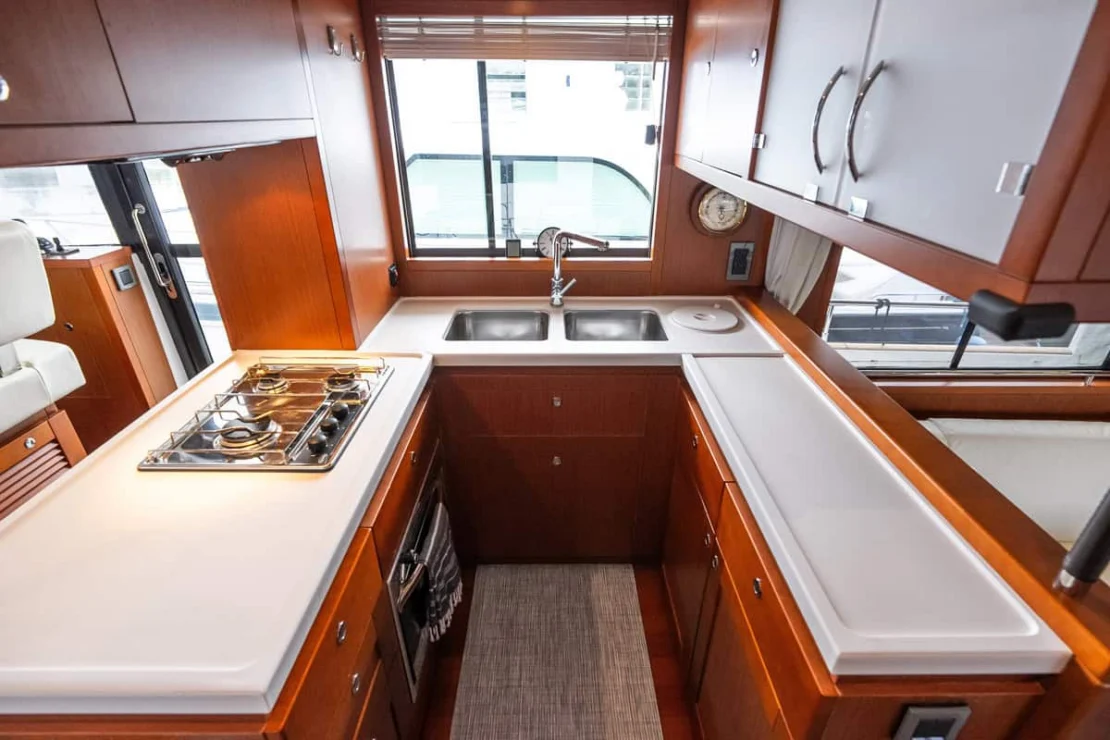 Beneteau Oceanis Swift Trawler 50 galley appliances and storage.