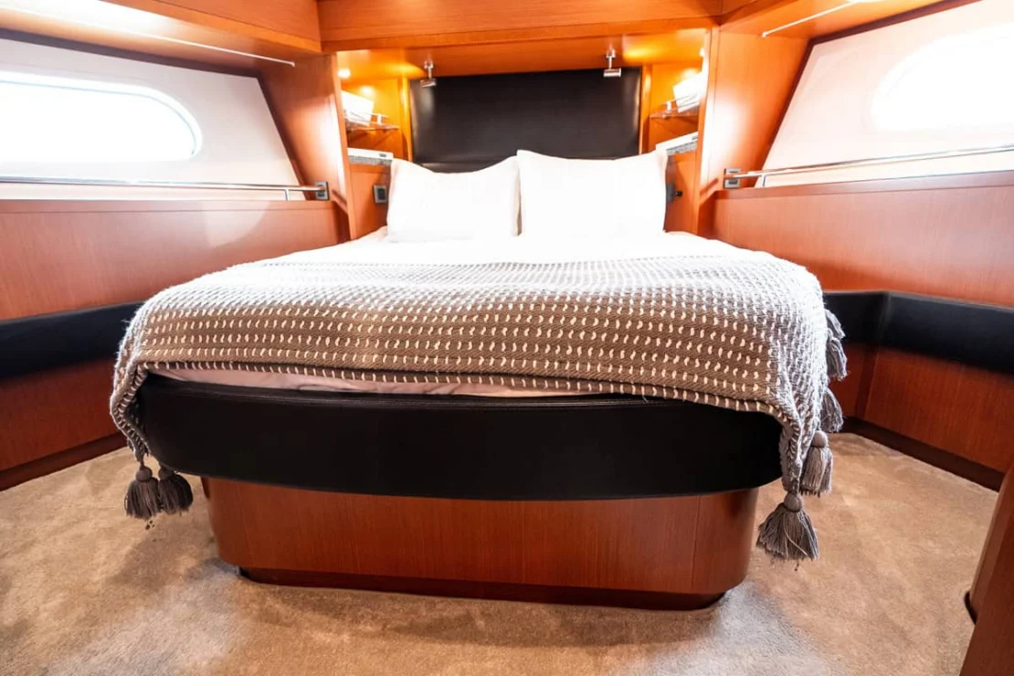 Beneteau Oceanis Swift Trawler 50 guest cabin berth.