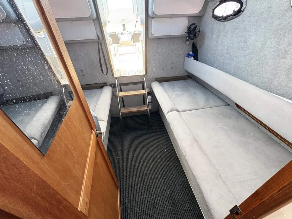 2011 Protector Tauranga 41 bunks looking aft to companionway.