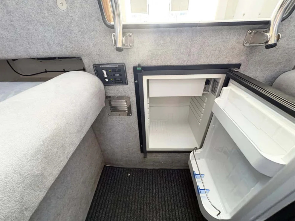 2011 Protector Tauranga 41 refrigerator door open.